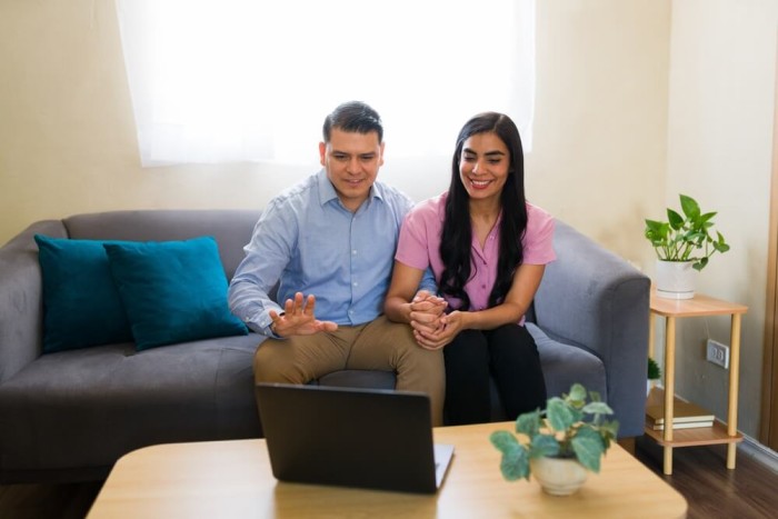 Child psychiatrist providing remote therapy to a family through telepsychiatry platform